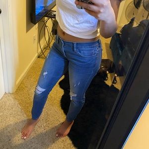 Petite distressed skinny jeans